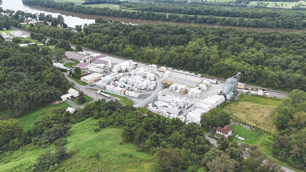 An aerial view of Herndon Reload’s wood processing and reload facilities in Herndon, Pennsylvania, shows its proximity to the Norfolk Southern Railroad and the Susquehanna River.